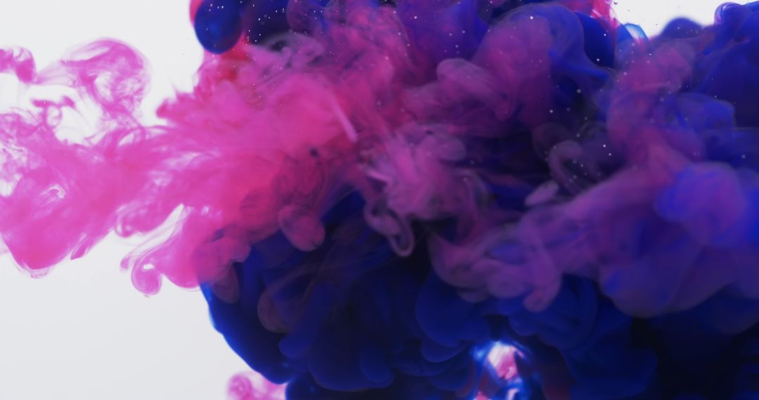 Colorful Ink Swirls in Water Form Abstract Art