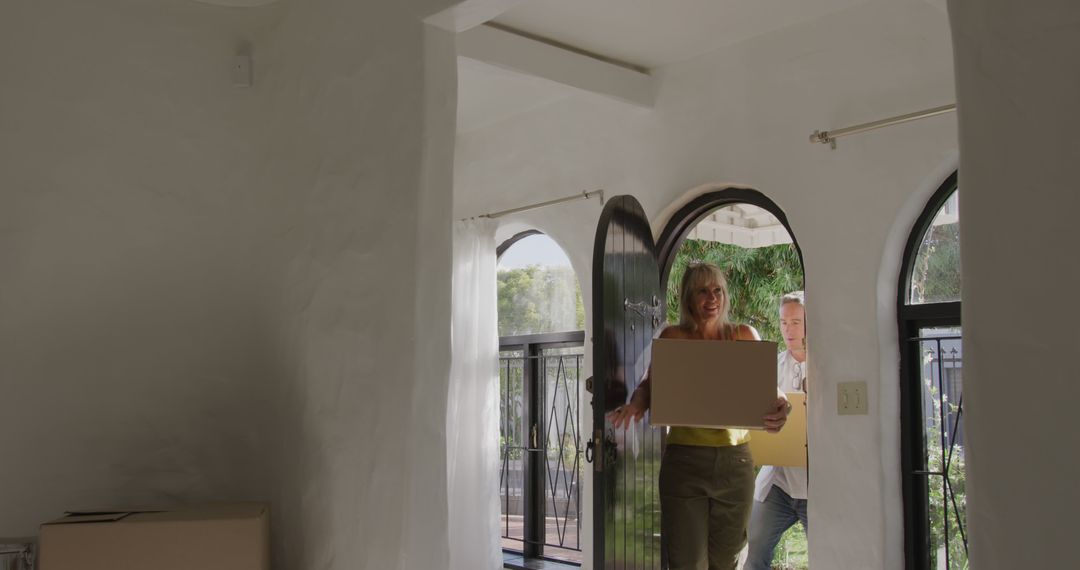 Happy Couple Moving into New Bright Home