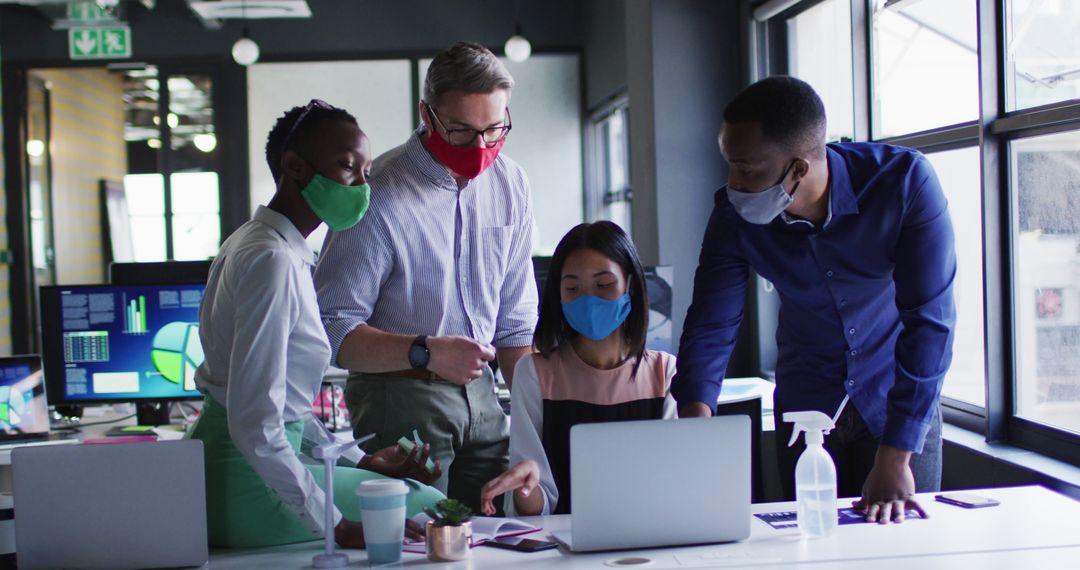 Diverse Office Team Collaborating in Modern Workspace