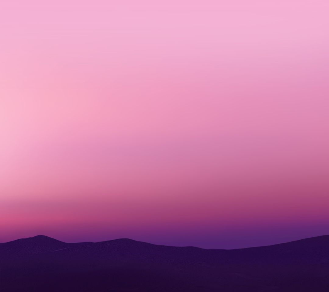 Tranquil Pink and Purple Sunset Over Mountains Landscape - Free Images, Stock Photos and Pictures on Pikwizard.com