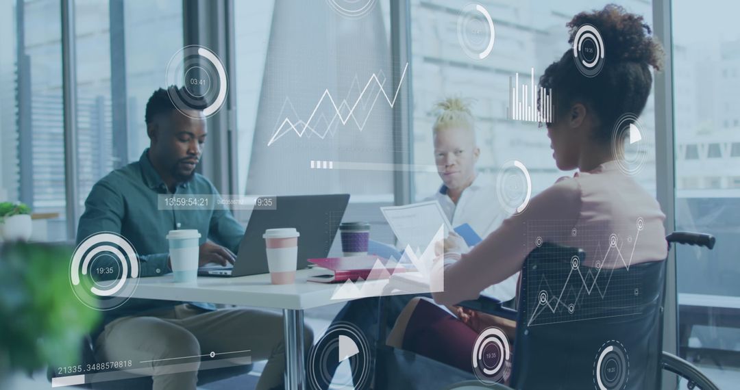 Diverse Team Analyzing Digital Data in Modern Office Environment