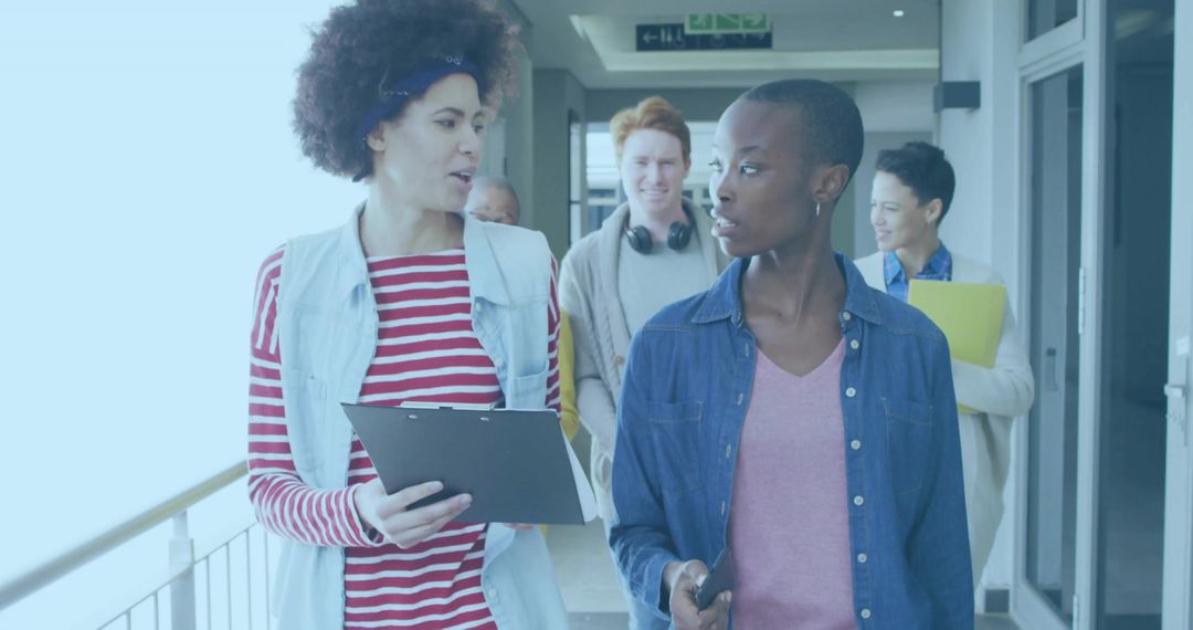 Diverse Young Professionals Collaborating in Modern Workplace