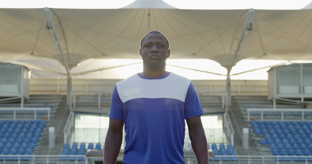 Confident Field Hockey Player Walking on Pitch in Team Jersey