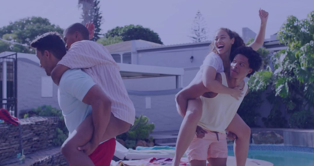 Friends Enjoying Piggyback Rides at Poolside Gathering