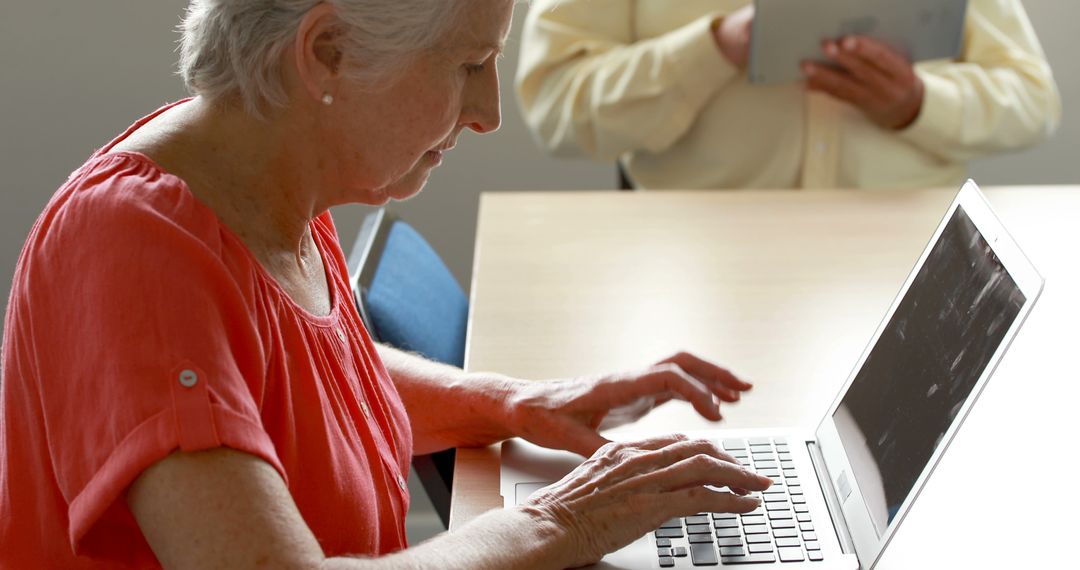 Senior Individuals Engaging with Technology at Home