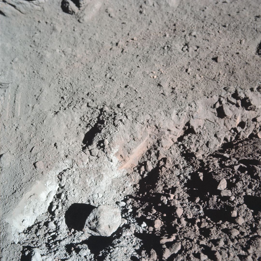 View of the orange soil which Apollo 17 crewmen found at Station 4 during EVA - Free Images, Stock Photos and Pictures on Pikwizard.com