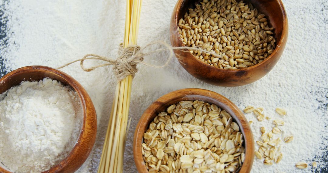 Variety of Grains and Flour in Wooden Bowls - Free Images, Stock Photos and Pictures on Pikwizard.com