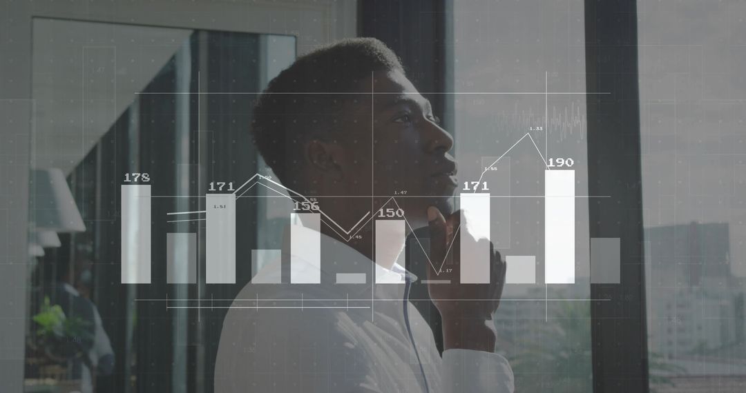 Business Professional Analyzing Data Overlaid with Analytical Chart