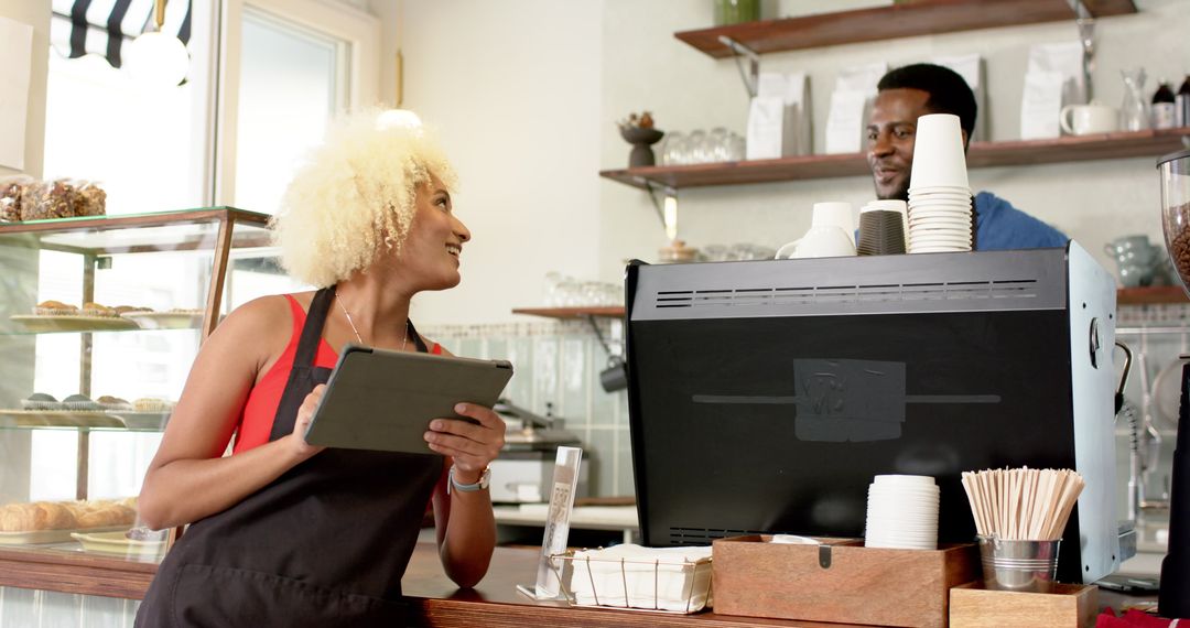 Diverse Team Collaborating in Coffee Shop Environment