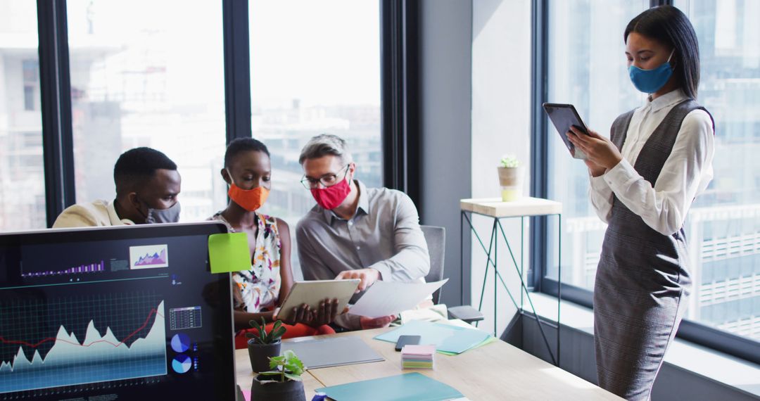 Corporate Team Meeting Using Technology During Pandemic