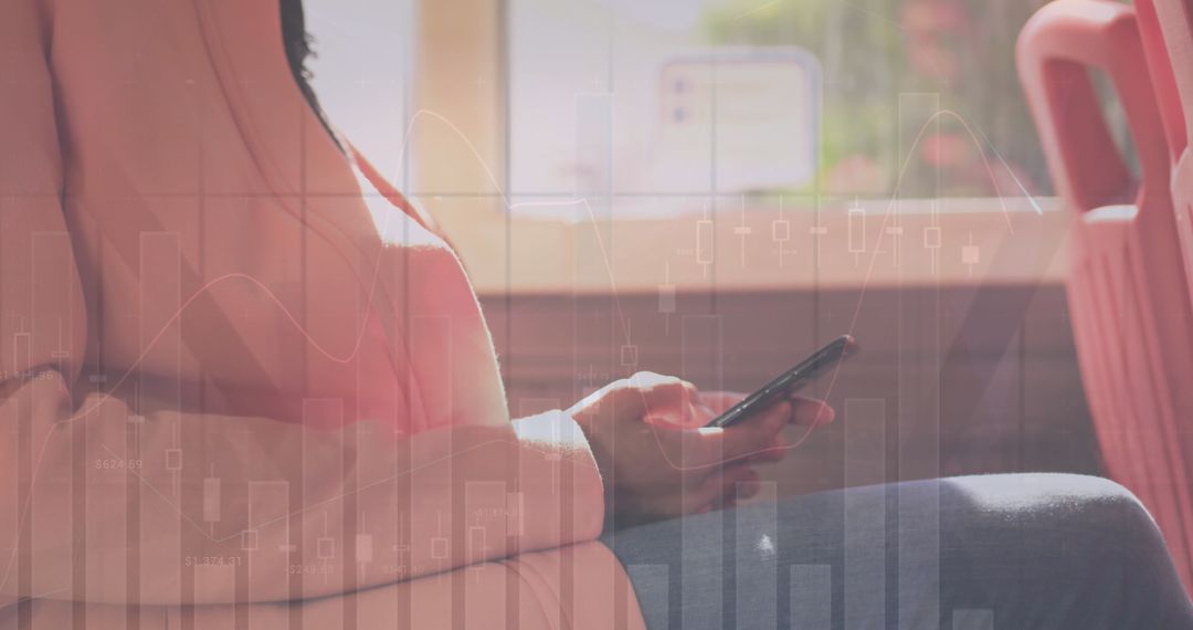 Woman on Bus Analyzing Digital Business Data on Smartphone