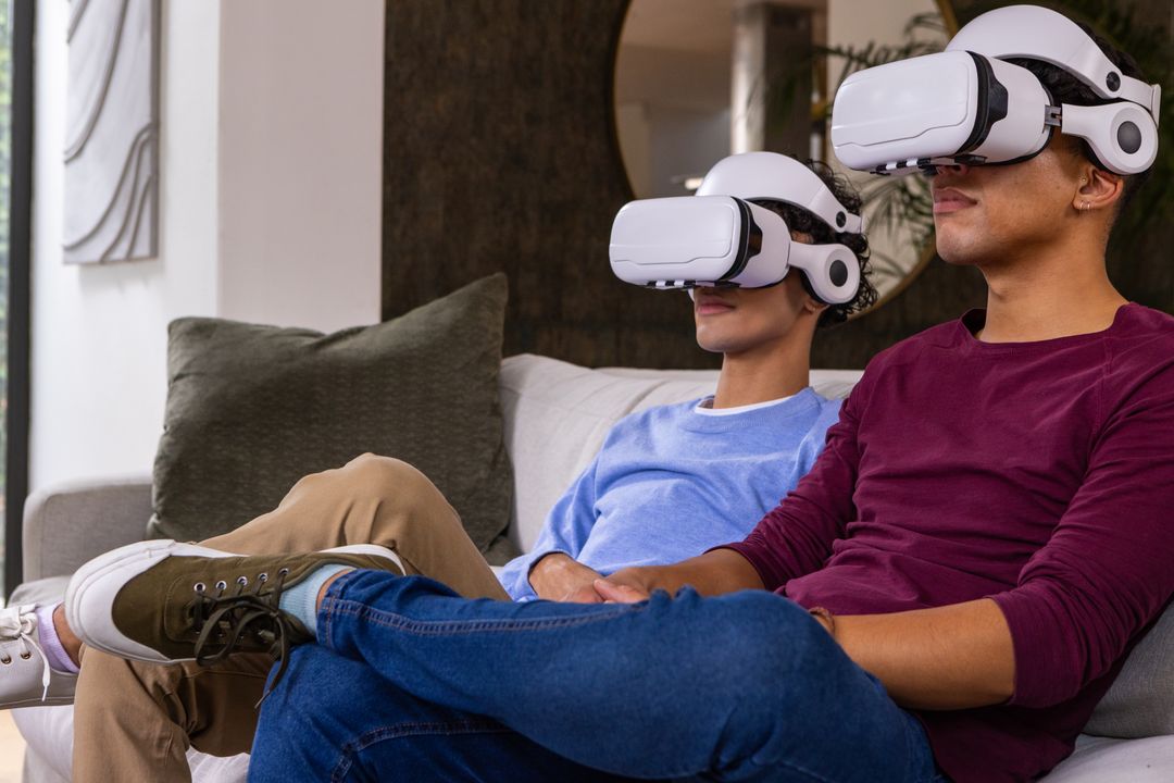 Friends Enjoying Virtual Reality at Home on Couch