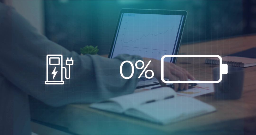 Working woman typing on laptop, showing 0% battery and EV charging station icon overlay