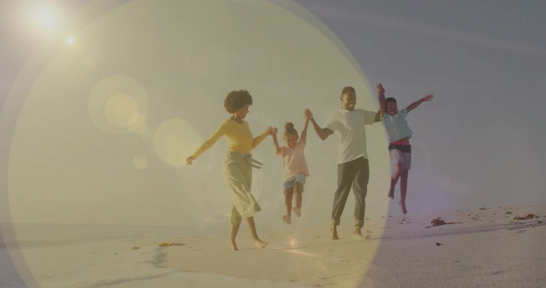 Joyful Family Playing on Sunny Beach with Lens Flare