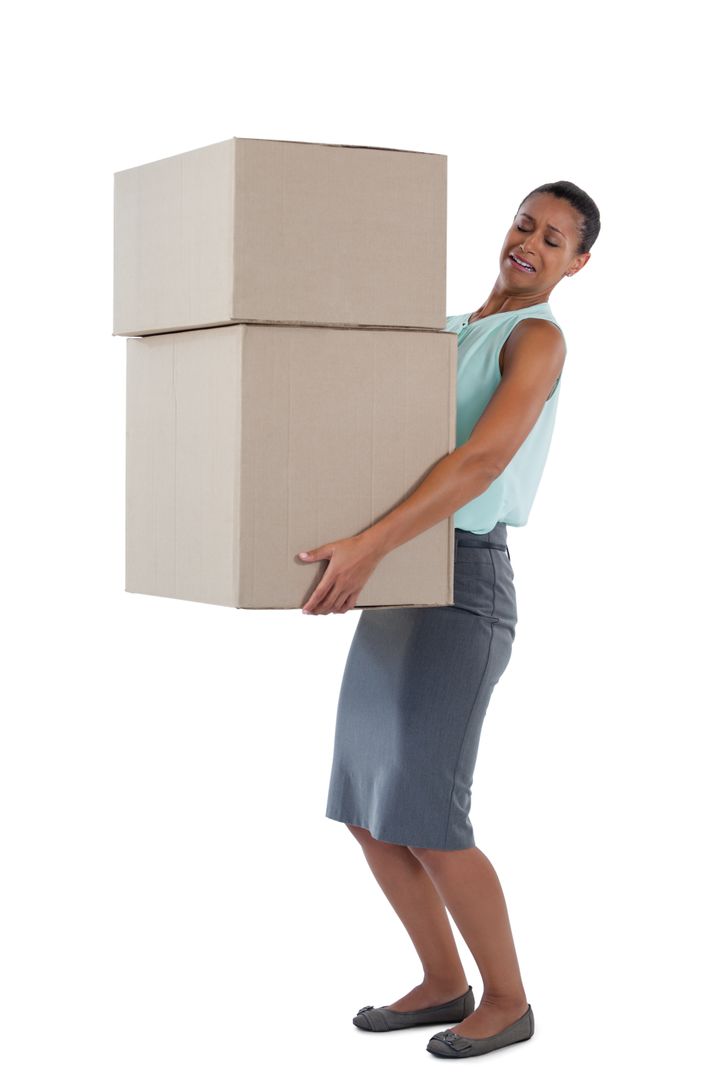 Businesswoman carrying heavy boxes - Free Images, Stock Photos and Pictures on Pikwizard.com