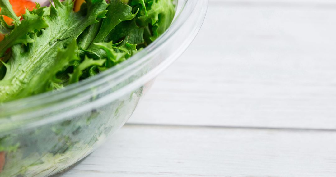 Close-Up of Fresh Vegetable Salad in Glass Bowl