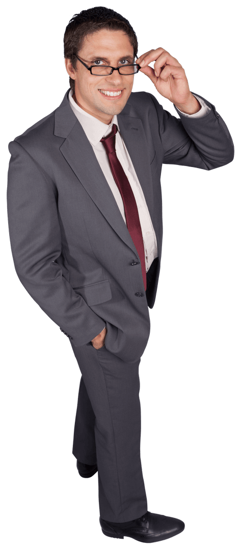 Confident Businessman Adjusting Glasses in Gray Suit