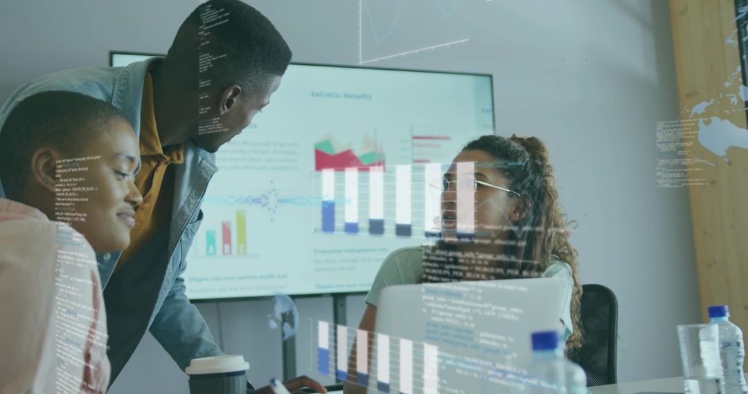 Team Analyzing Data Insights with Interactive Technology in Conference Room