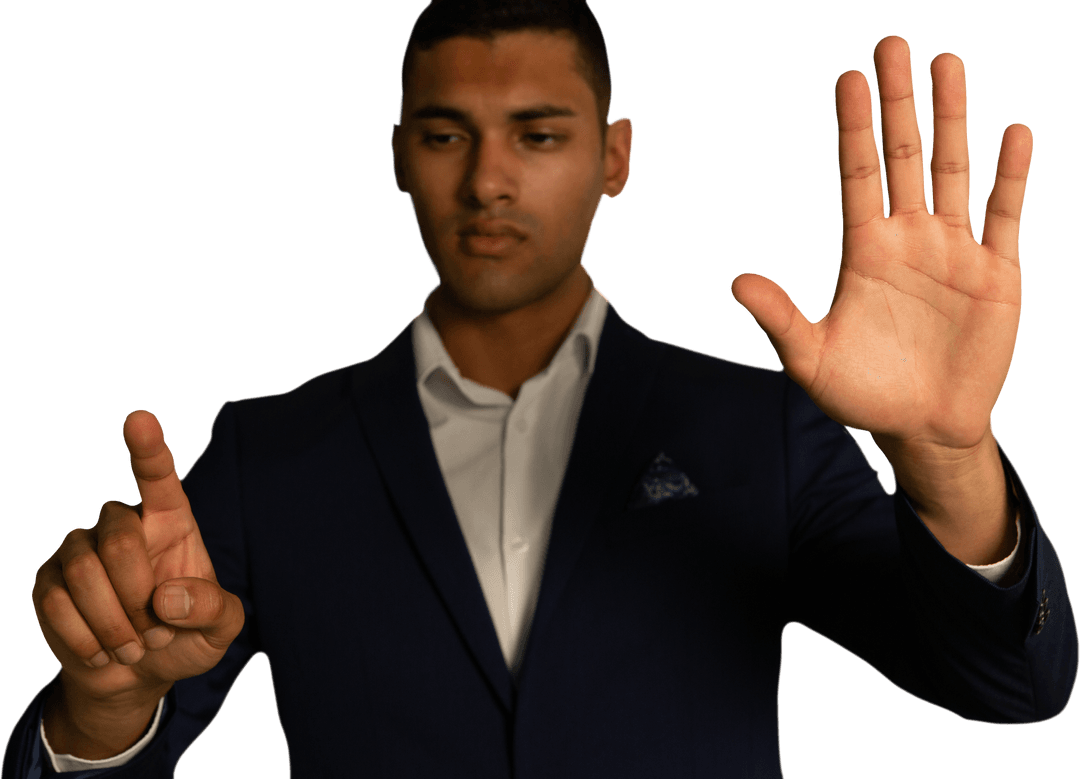 Businessman interacting with transparent interface in focused gesture