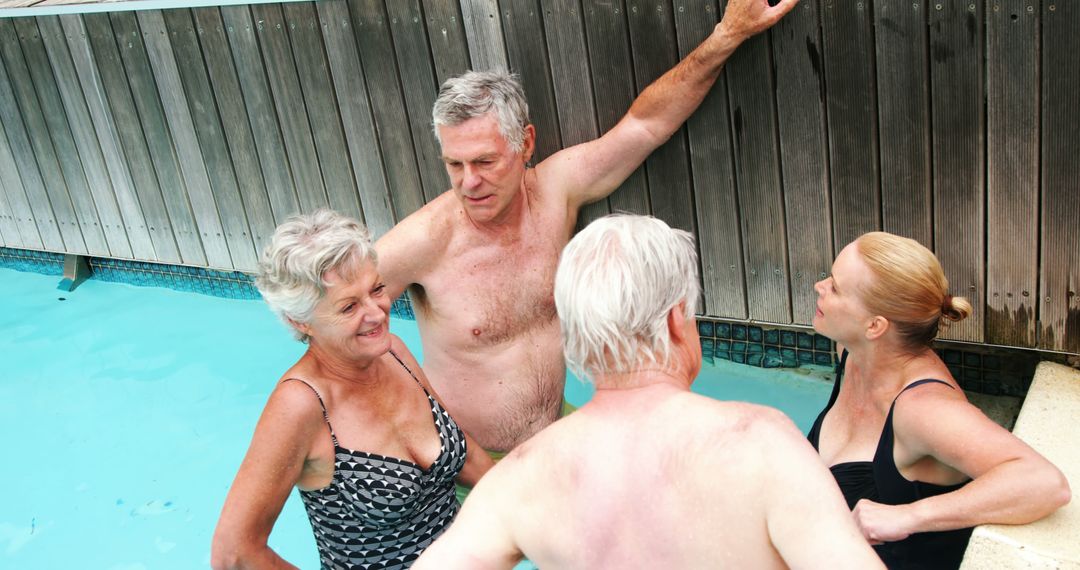 Senior Friends Having Conversation in Swimming Pool - Free Images, Stock Photos and Pictures on Pikwizard.com