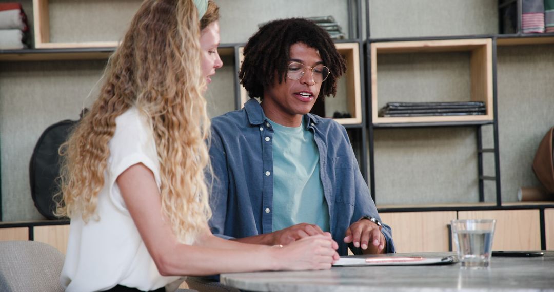 Diverse Professionals Collaborating at Modern Office Desk