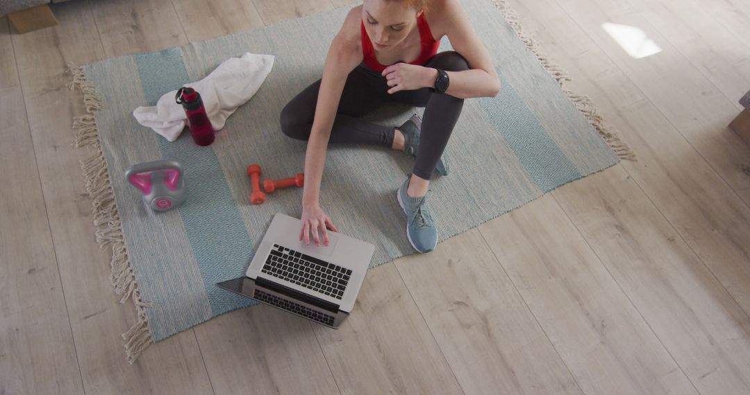 Young Woman Doing Online Workout at Home - Free Images, Stock Photos and Pictures on Pikwizard.com