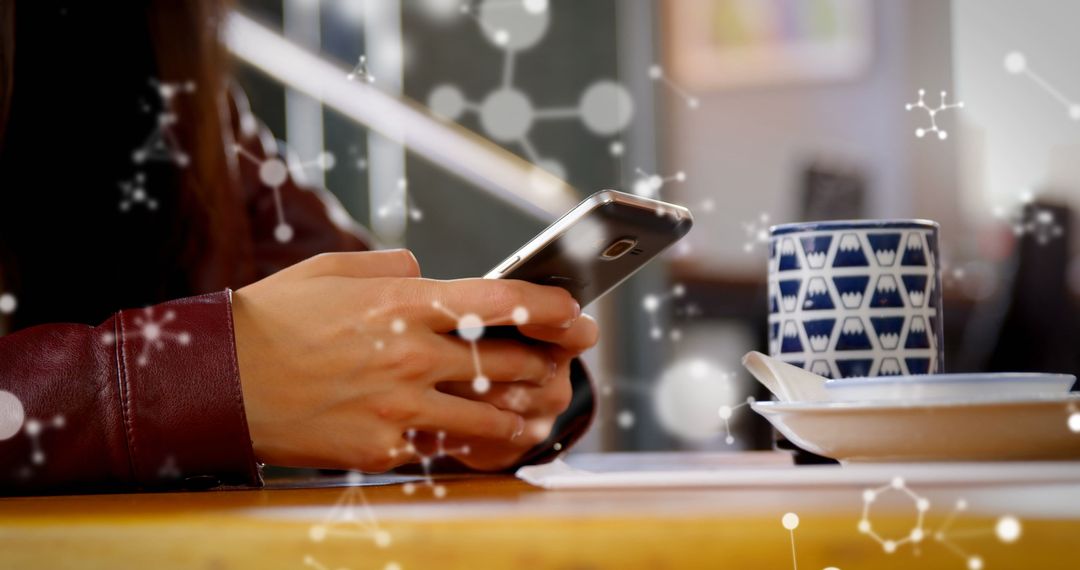 Hands Using Smartphone with Overlayed Molecular Structures