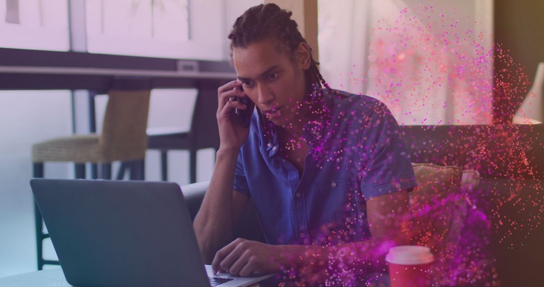 Businessman Engaging in Phone Call with Laptop and Virtual Overlay