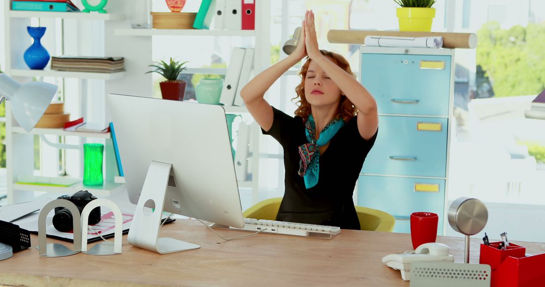 Stressed Businesswoman Praying for Successful Outcome at Modern Office Desk - Free Images, Stock Photos and Pictures on Pikwizard.com