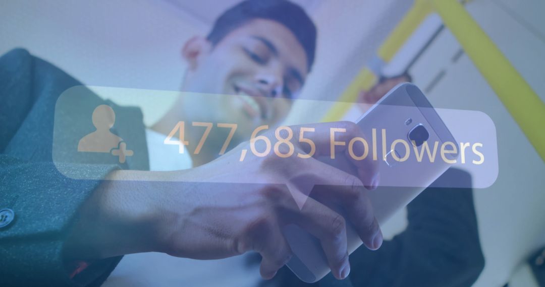 Smiling Young Man Viewing Social Media Follower Count on Smartphone