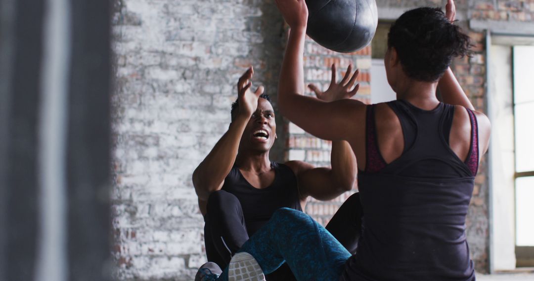 Two Women Working Out Together with Medicine Ball in Gym - Free Images, Stock Photos and Pictures on Pikwizard.com