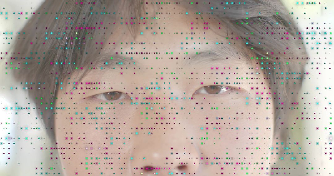 Facing Asian male closeup with colorful pixel glitch overlay conveying digital identity