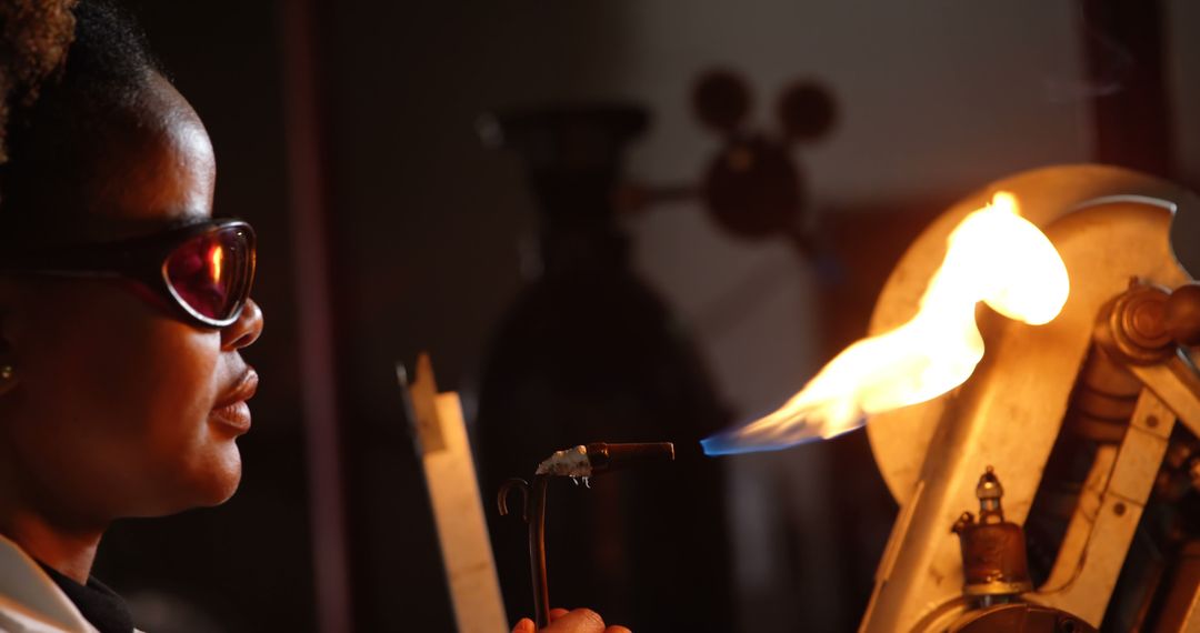 Female Scientist Conducting Flame Test in Laboratory - Free Images, Stock Photos and Pictures on Pikwizard.com