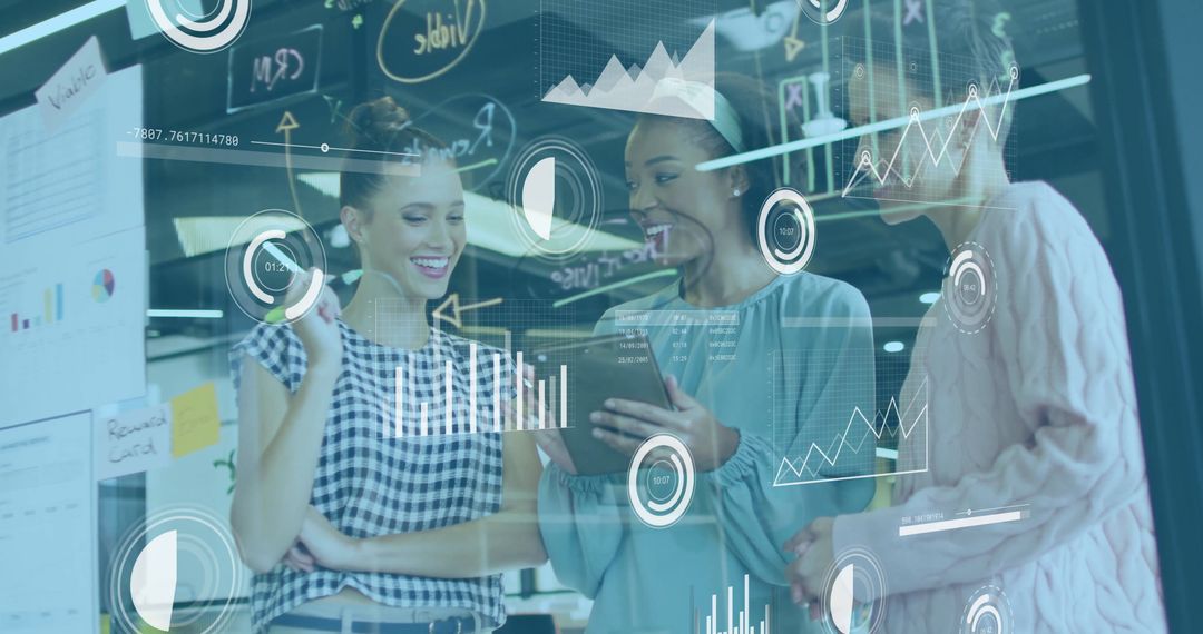 Diverse Female Colleagues Utilizing Innovative Digital Interface