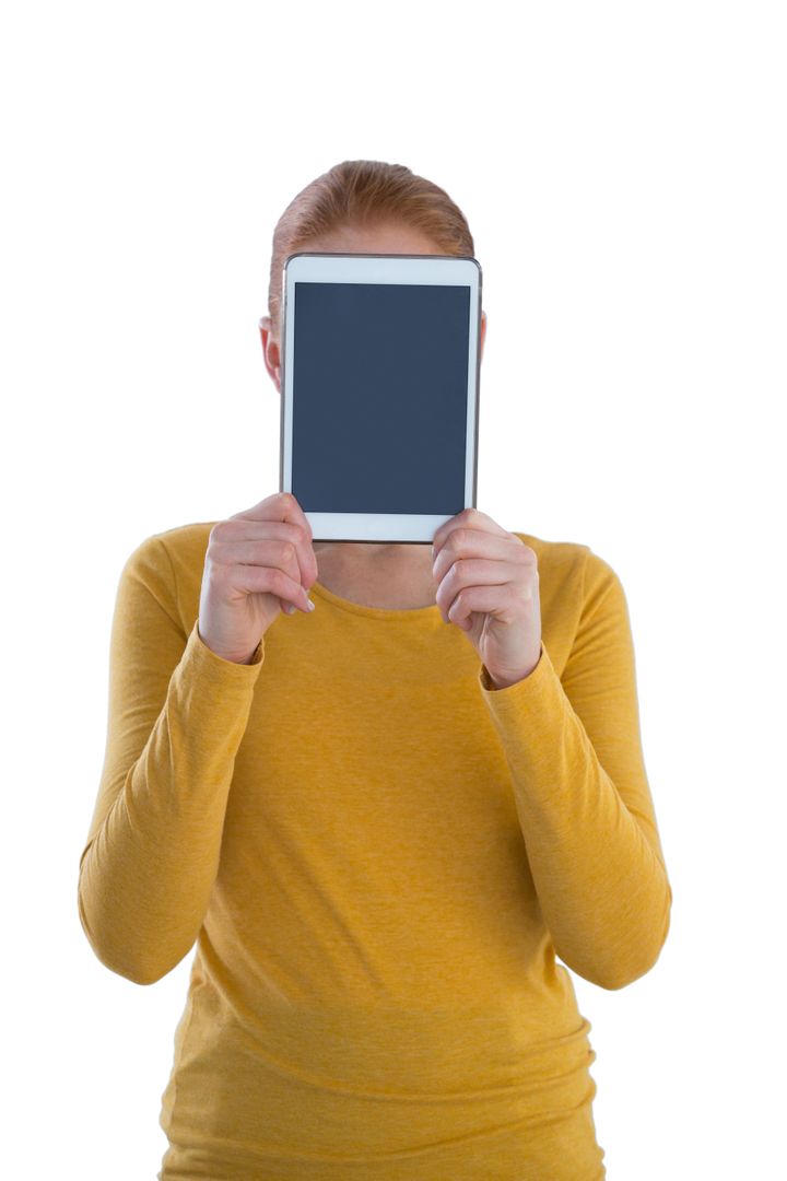 Businesswoman holding digital tablet in front of face - Free Images, Stock Photos and Pictures on Pikwizard.com