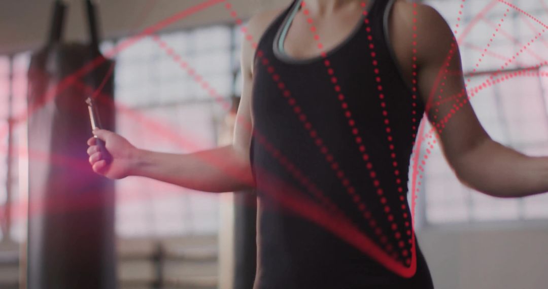 Woman Jumping Rope with Dynamic Red Dotted Path Lines at Gym