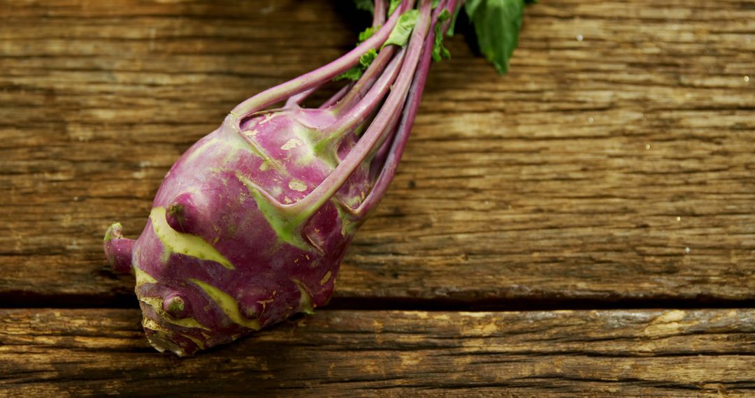 Fresh Purple Kohlrabi On Rustic Wooden Table - Free Images, Stock Photos and Pictures on Pikwizard.com