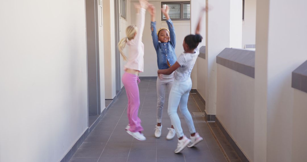 Joyful School Corridors: Girls Laughing and Jumping in Unison