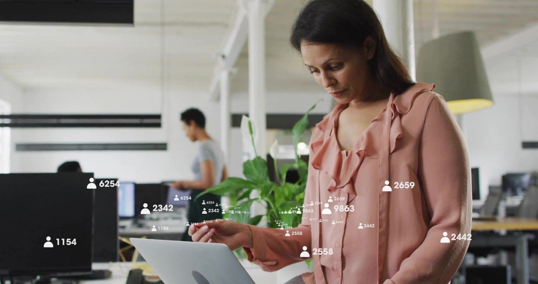 Digital Networking Woman in Open Office with Overlaid Metrics