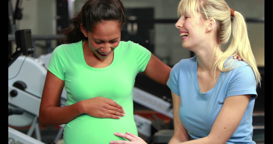 Pregnant Women Exercising in Gym and Smiling - Free Images, Stock Photos and Pictures on Pikwizard.com