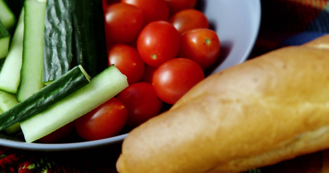 Fresh Cherry Tomatoes, Cucumber Sticks, Loaf of Bread