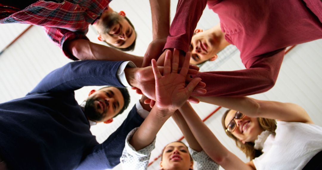 Diverse Team Building Unity through Hand Stack Gesture - Free Images, Stock Photos and Pictures on Pikwizard.com