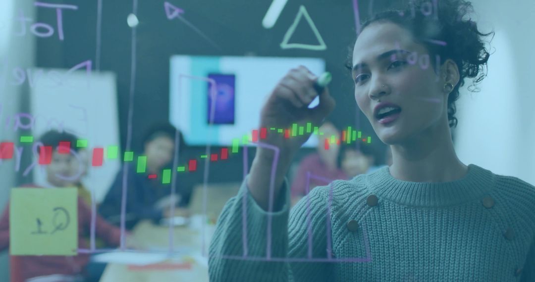 Team Strategizing with Candlestick Charts in Modern Office