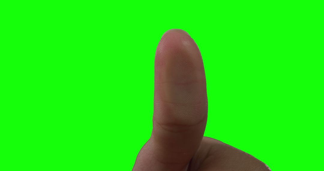 Close-up of Thumb Making Thumbs Up Gesture on Green Background - Free Images, Stock Photos and Pictures on Pikwizard.com