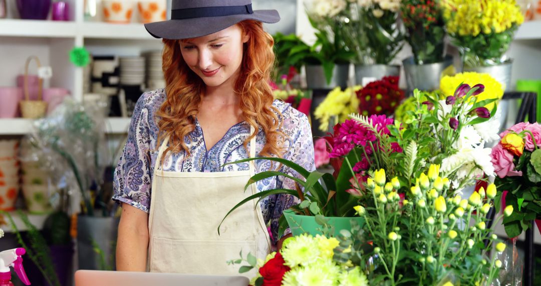 Female Florist Arranging Flowers in Shop - Free Images, Stock Photos and Pictures on Pikwizard.com