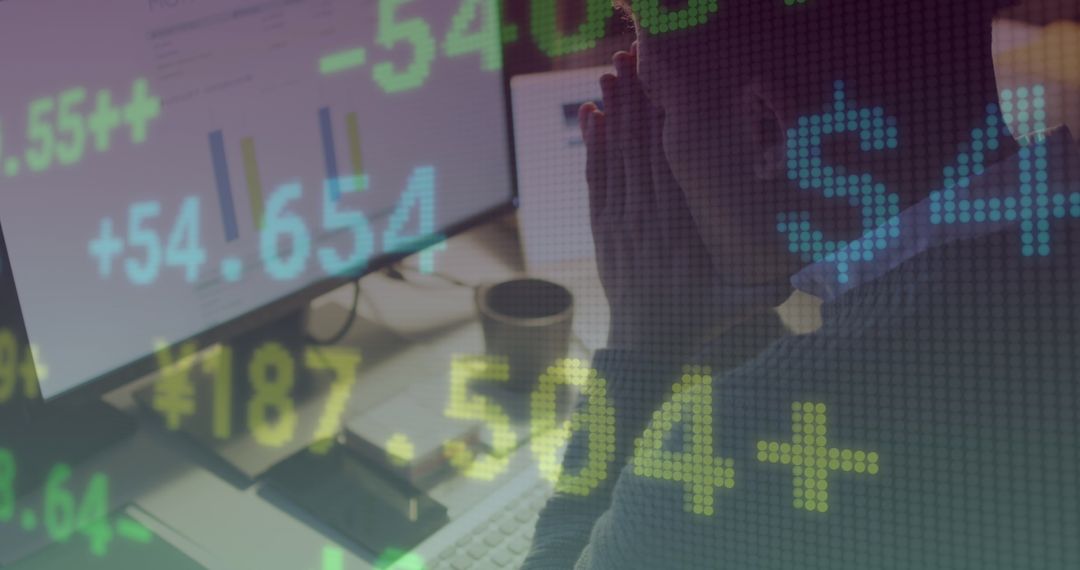 Businessman Analyzing Financial Growth Charts on Computer