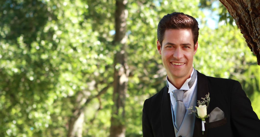 Groom Smiling Outdoors in Formal Wedding Attire - Free Images, Stock Photos and Pictures on Pikwizard.com