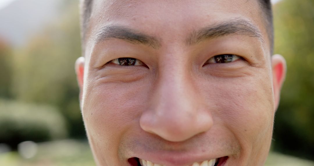 Smiling Man Outdoors Close-Up Portrait - Free Images, Stock Photos and Pictures on Pikwizard.com