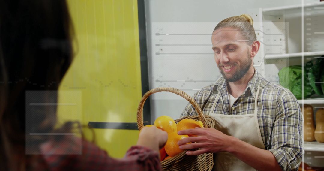 Store Clerk Handing Basket of Oranges to Customer in Market