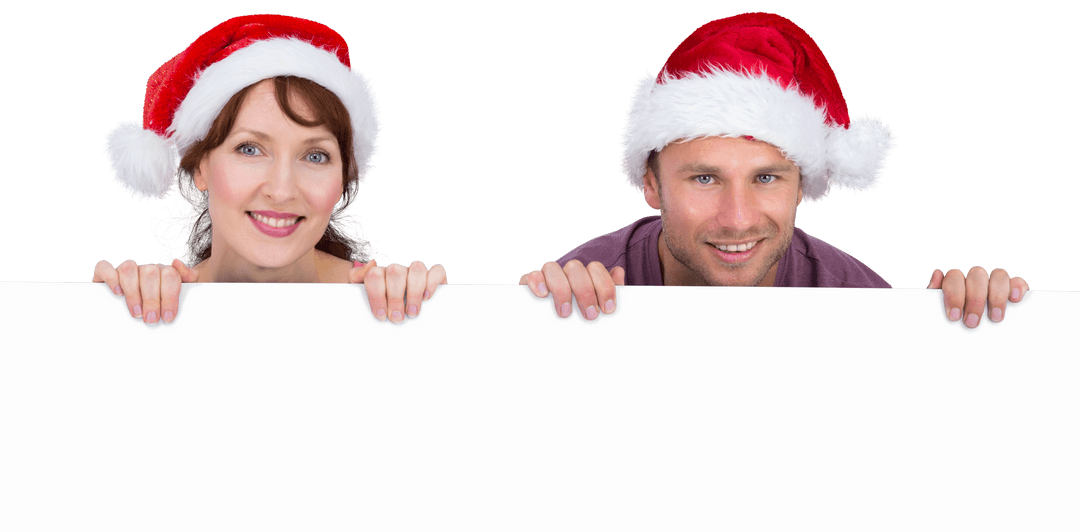 Smiling Couple with Santa Hats and Blank Sign Transparent Background